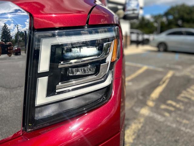 Photo of 2021 Cardinal Red Metallic Nissan Titan