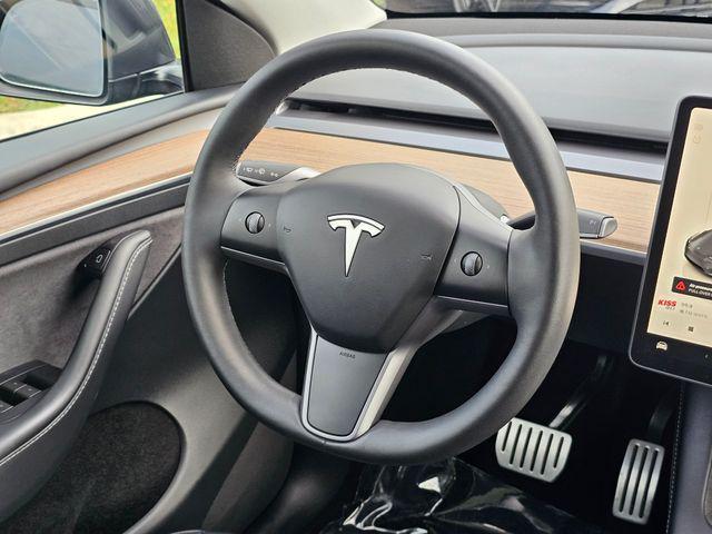 Photo of 2023 Midnight Silver Metallic Tesla Model Y