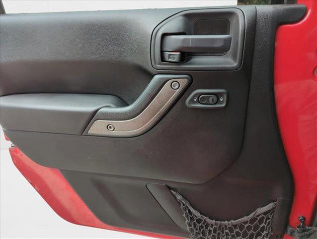 Photo of 2014 Flame Red Clearcoat Jeep Wrangler Unlimited