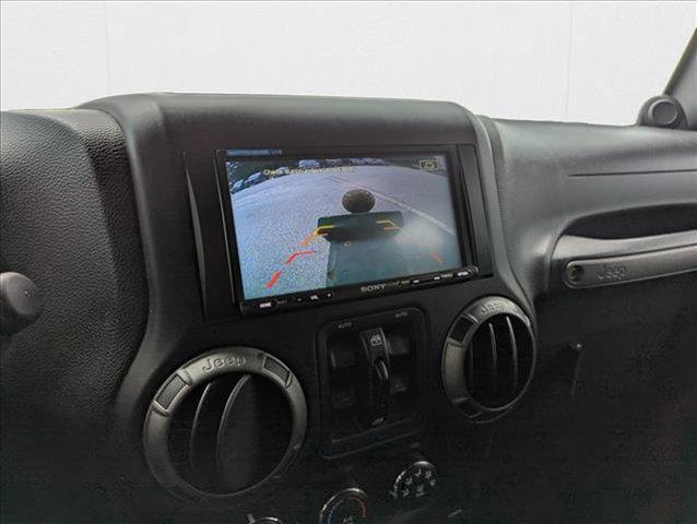 Photo of 2014 Flame Red Clearcoat Jeep Wrangler Unlimited