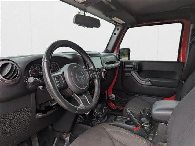 Photo of 2014 Flame Red Clearcoat Jeep Wrangler Unlimited