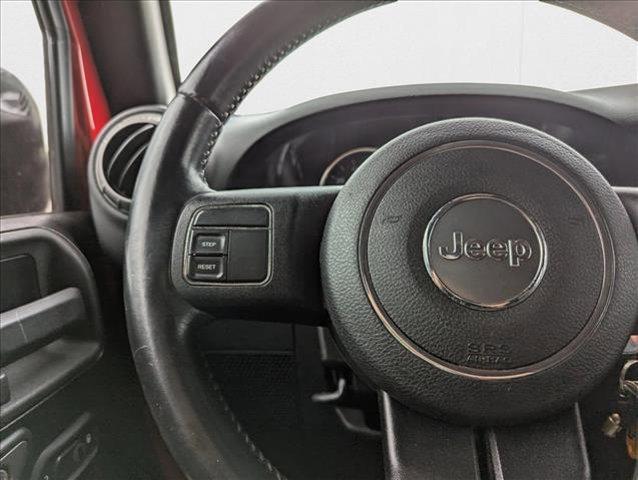Photo of 2014 Flame Red Clearcoat Jeep Wrangler Unlimited