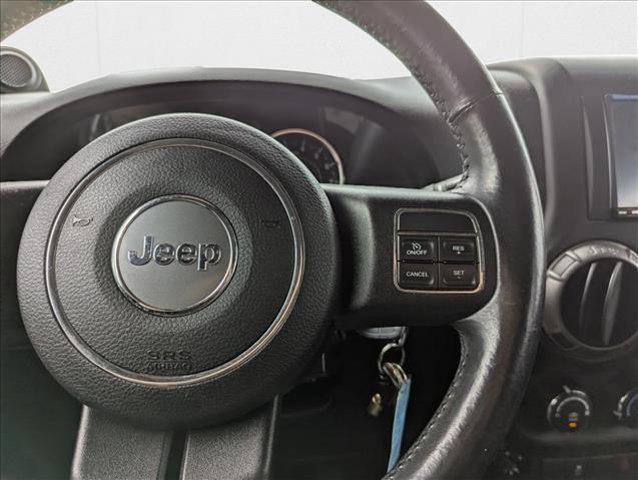 Photo of 2014 Flame Red Clearcoat Jeep Wrangler Unlimited
