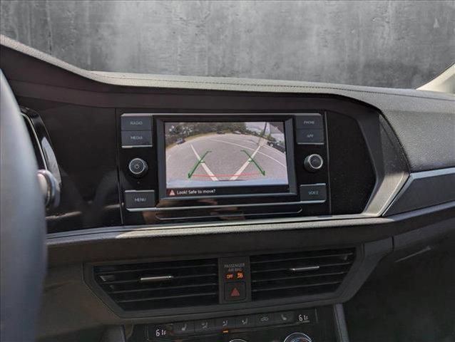 Photo of 2023 Opal White Pearl Volkswagen Jetta