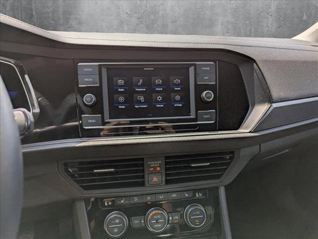 Photo of 2023 Opal White Pearl Volkswagen Jetta