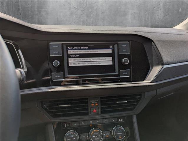 Photo of 2023 Opal White Pearl Volkswagen Jetta