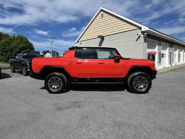 Photo of 2025 Solar Orange GMC HUMMER EV Pickup