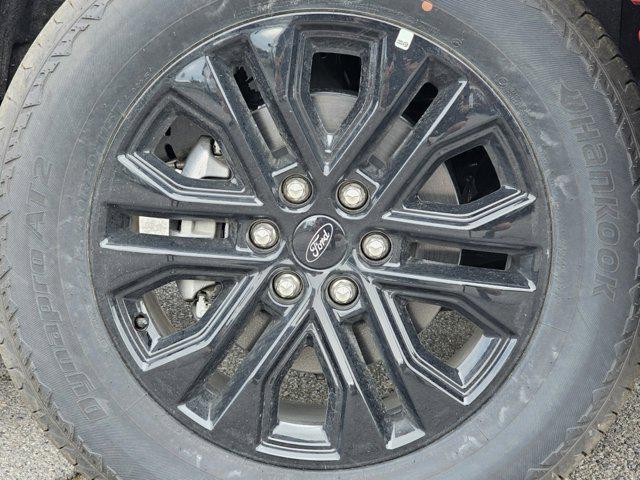 Photo of 2025 Rapid Red Metallic Tinted Clearcoat Ford F-150
