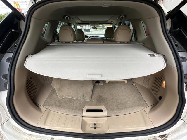 Photo of 2014 White Nissan Rogue