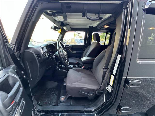 Photo of 2015 Black Jeep Wrangler Unlimited