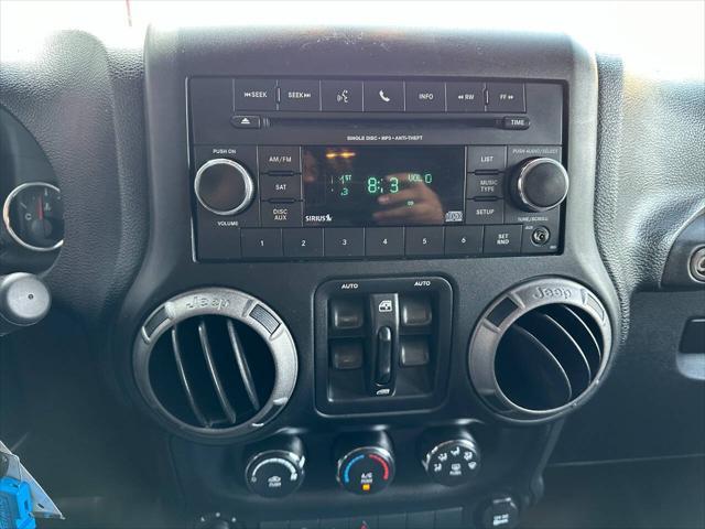 Photo of 2015 Black Jeep Wrangler Unlimited