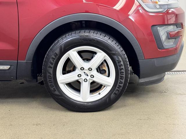 Photo of 2016 Ruby Red Metallic Ford Explorer