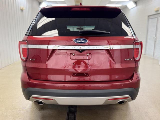 Photo of 2016 Ruby Red Metallic Ford Explorer