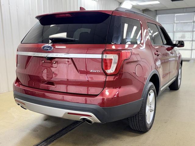 Photo of 2016 Ruby Red Metallic Ford Explorer
