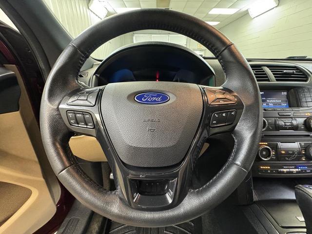 Photo of 2016 Ruby Red Metallic Ford Explorer