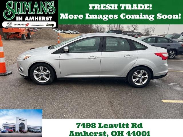 Photo of 2014 Ingot Silver Metallic Ford Focus