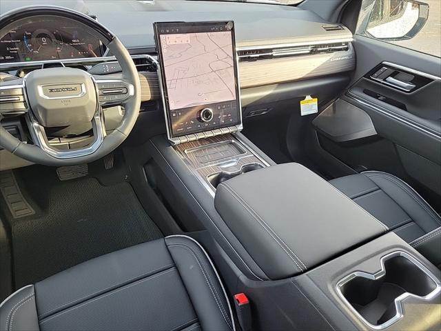 Photo of 2025 Summit White GMC Sierra EV