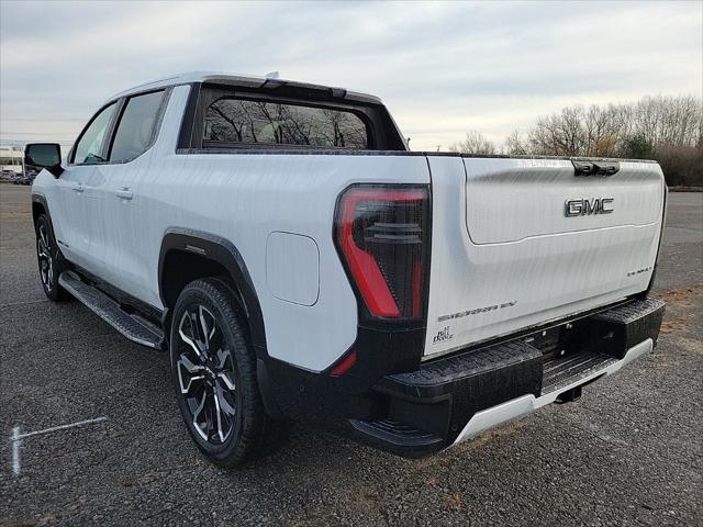 Photo of 2025 Summit White GMC Sierra EV