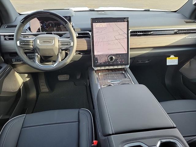 Photo of 2025 Summit White GMC Sierra EV