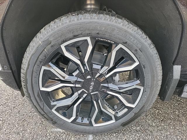 Photo of 2025 Summit White GMC Sierra EV