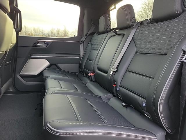 Photo of 2025 Summit White GMC Sierra EV