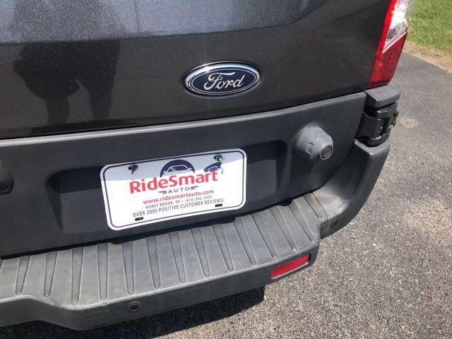 Photo of 2016 Charcoal Gray Ford Transit-350