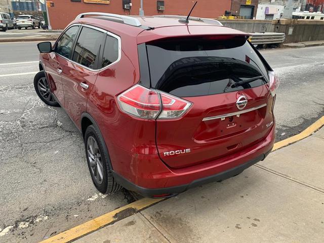 Photo of 2015 Cayenne Red Nissan Rogue