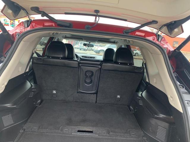 Photo of 2015 Cayenne Red Nissan Rogue