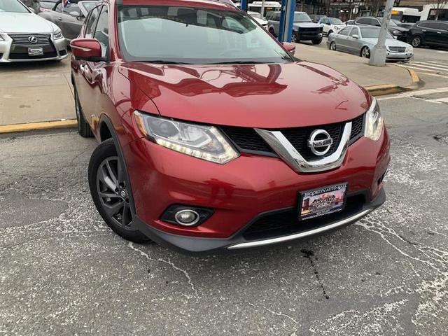 Photo of 2015 Cayenne Red Nissan Rogue