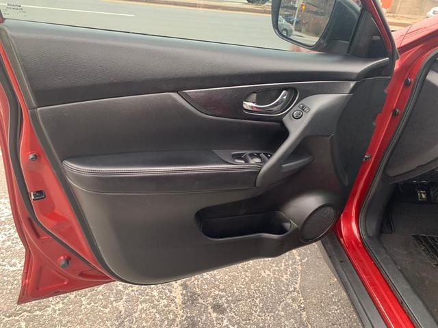 Photo of 2015 Cayenne Red Nissan Rogue