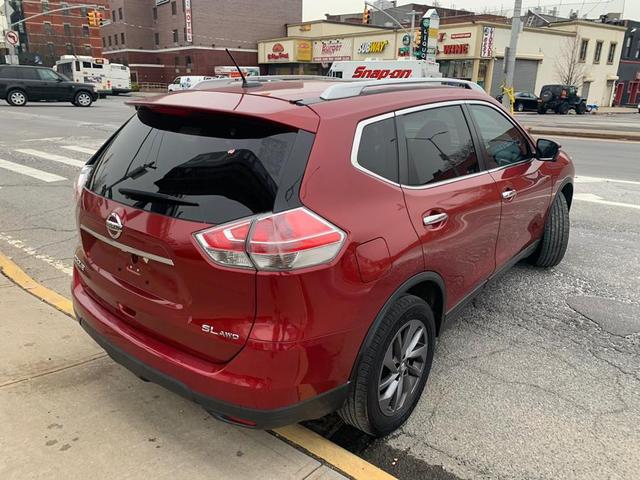 Photo of 2015 Cayenne Red Nissan Rogue