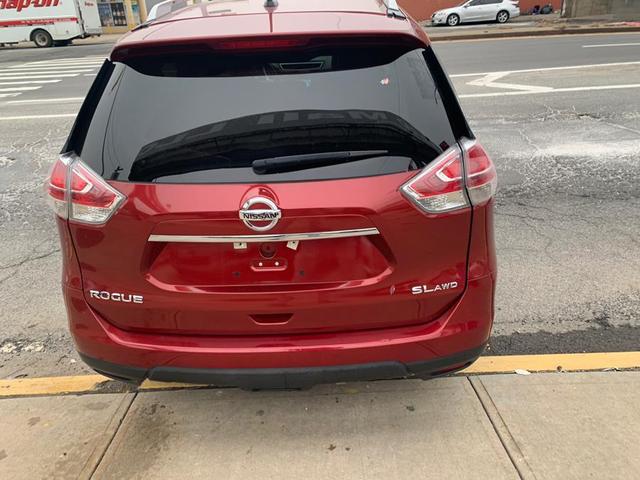 Photo of 2015 Cayenne Red Nissan Rogue