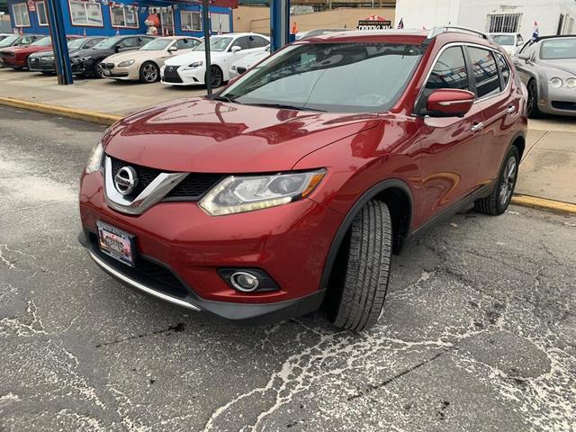 Photo of 2015 Cayenne Red Nissan Rogue