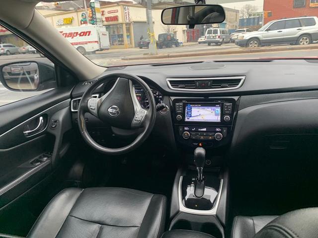 Photo of 2015 Cayenne Red Nissan Rogue
