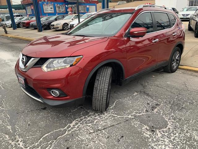 Photo of 2015 Cayenne Red Nissan Rogue