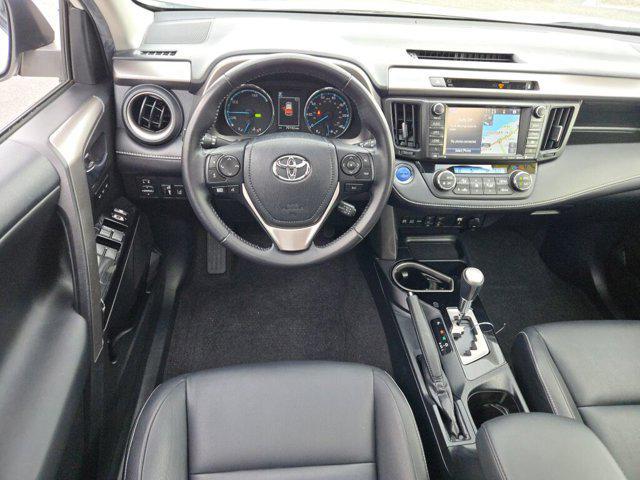 Photo of 2016 Blizzard Pearl Toyota RAV4 Hybrid