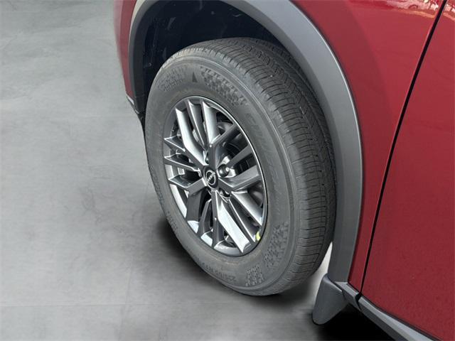 Photo of 2026 Scarlet Ember Tintcoat Nissan Rogue