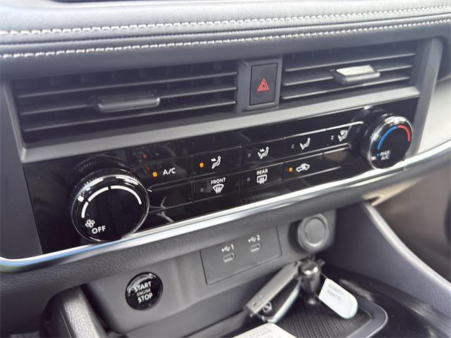 Photo of 2026 Scarlet Ember Tintcoat Nissan Rogue