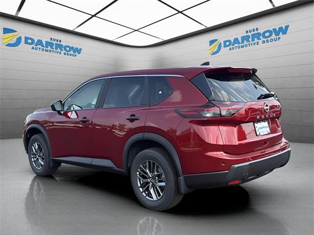 Photo of 2026 Scarlet Ember Tintcoat Nissan Rogue