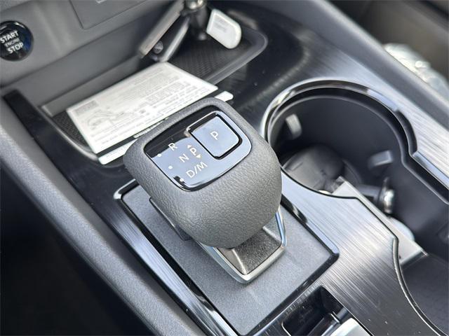 Photo of 2026 Scarlet Ember Tintcoat Nissan Rogue