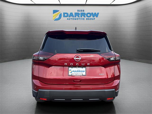 Photo of 2026 Scarlet Ember Tintcoat Nissan Rogue