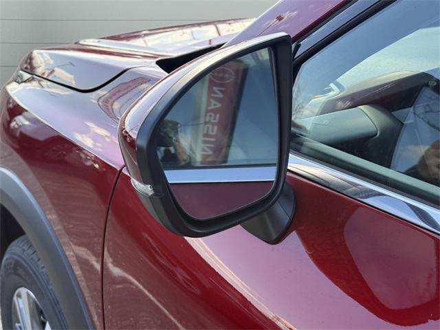 Photo of 2025 Scarlet Ember Tintcoat Nissan Pathfinder