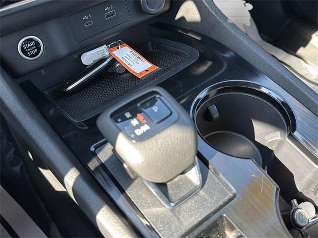 Photo of 2023 Pearl White Tricoat Nissan Rogue