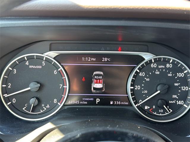 Photo of 2023 Pearl White Tricoat Nissan Rogue