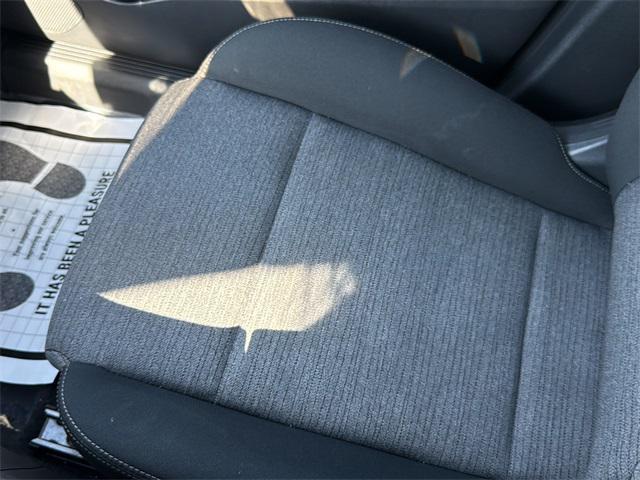 Photo of 2023 Pearl White Tricoat Nissan Rogue