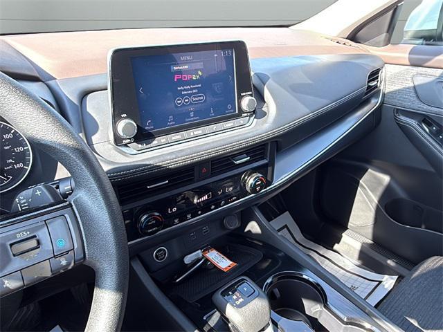 Photo of 2023 Pearl White Tricoat Nissan Rogue
