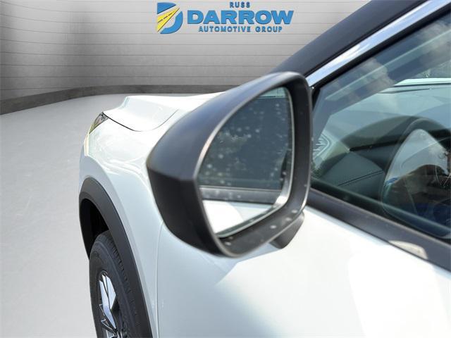 Photo of 2026 Glacier White Nissan Rogue