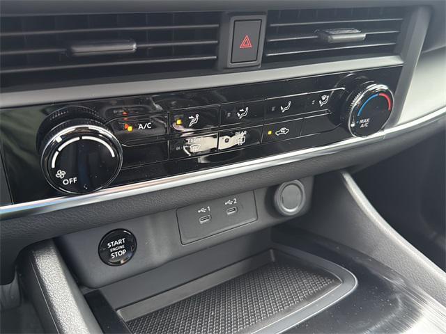 Photo of 2026 Scarlet Ember Tintcoat Nissan Rogue