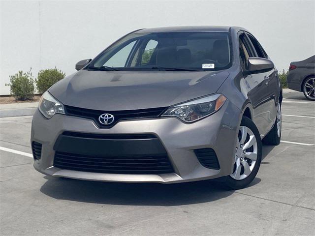 Photo of 2014 Brown Sugar Metallic Toyota Corolla