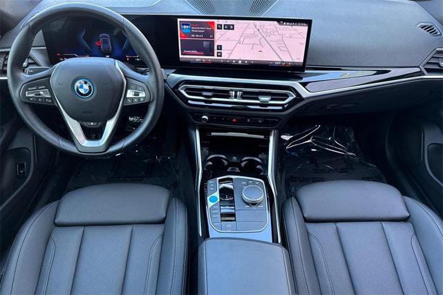 Photo of 2024 Black Sapphire Metallic BMW i4 Gran Coupe